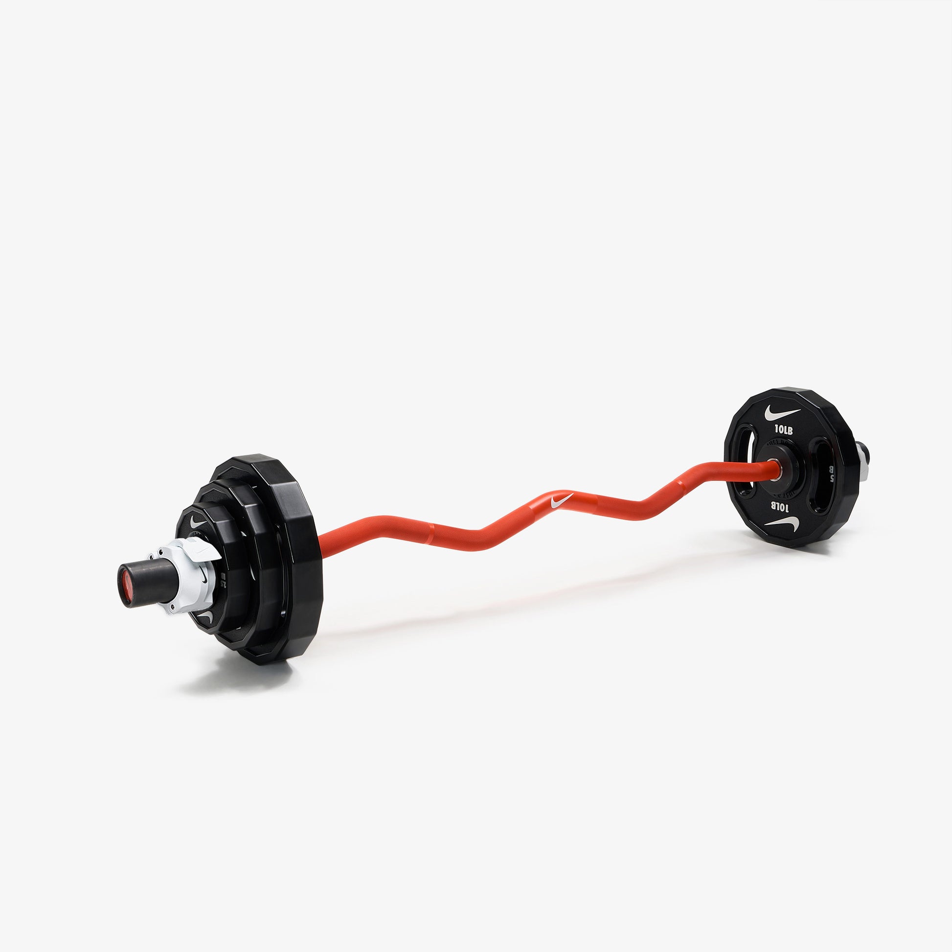 Nike Strength Shield Curl Bar - Orange Swoosh / Nike Strength Pro Urethane Plates (2.5 - 10 lb pairs) / White/Black