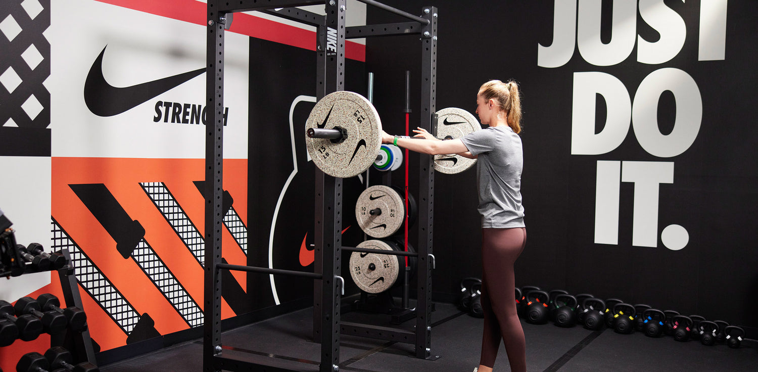 Nike athlete Nelly Korda preparing to lift using the Nike Squat Cage