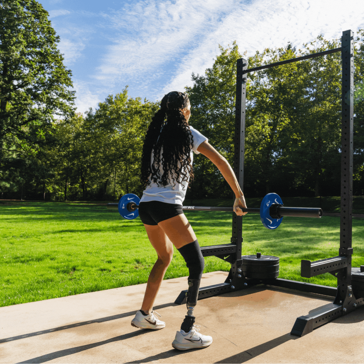 Paralympic adaptive athlete Beatriz Hatz snatching the Nike coated premium 15kg barbell