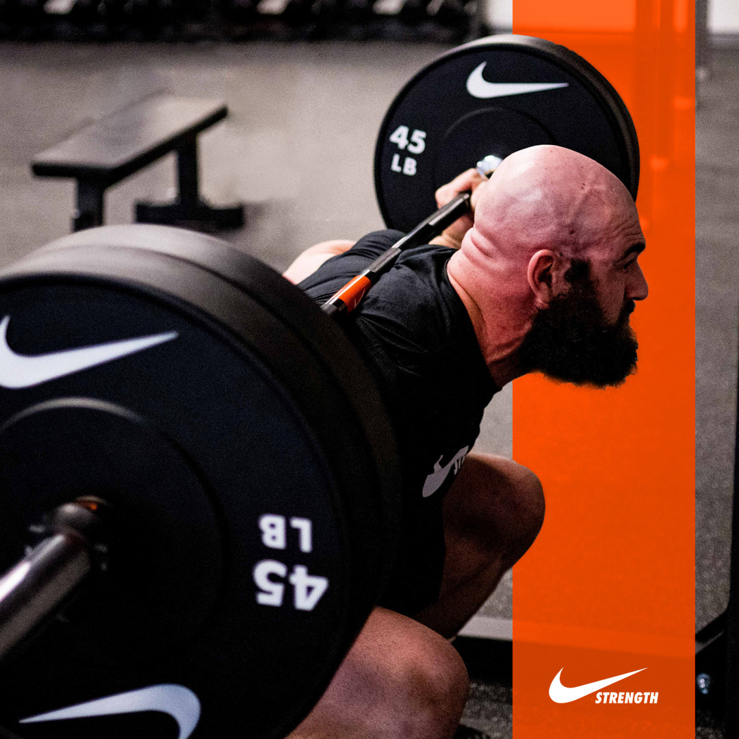 Nike Squat Stand / Black Bumper Plates / 20 kg Nike 1972 Power Bar