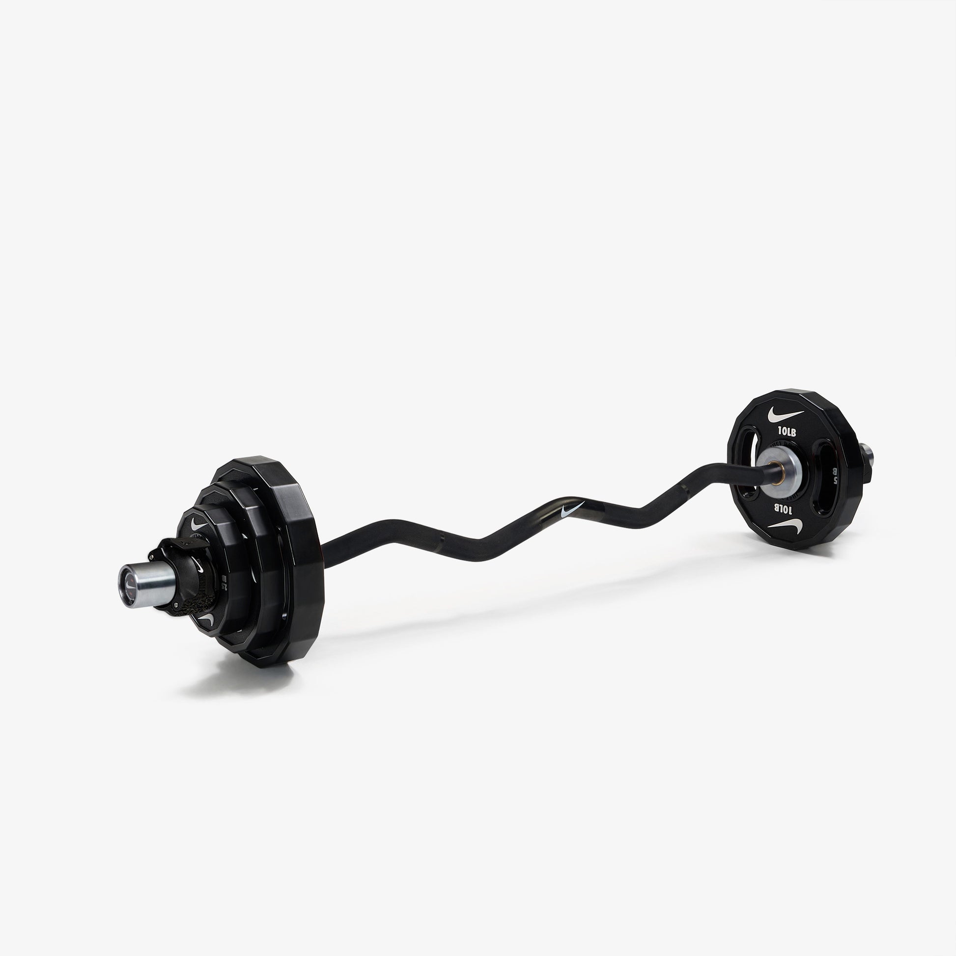 Nike Curl Bar - Black / Nike Strength Pro Urethane Plates (2.5 - 10 lb pairs) / Black/White