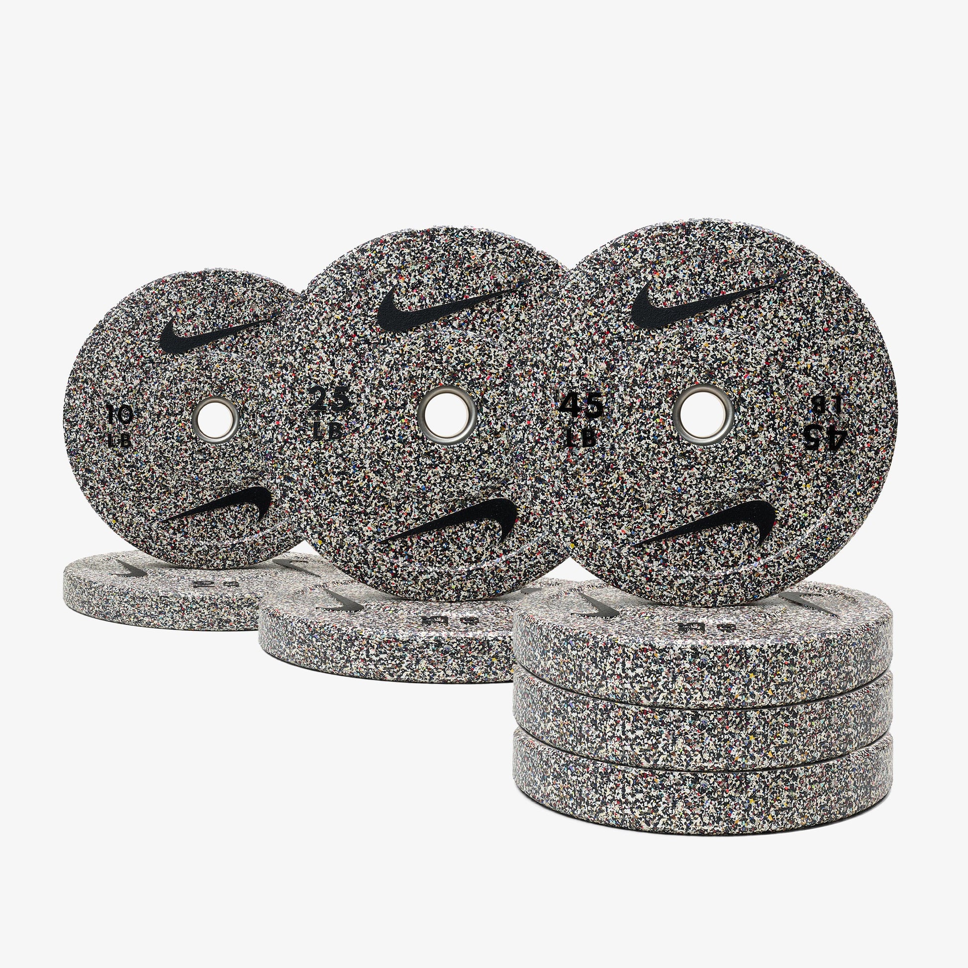Nike Squat Rack / Nike Grind Dumbbells + Plates / 15 kg Orange SWOOSH | Nike Squat Rack / Nike Grind Dumbbells + Plates / 20 kg Black ("Just Do It") | Nike Squat Rack / Nike Grind Dumbbells + Plates / 20 kg Orange SWOOSH | Nike Squat Rack / Nike Grind Dumbbells + Plates / 20 kg Red SWOOSH