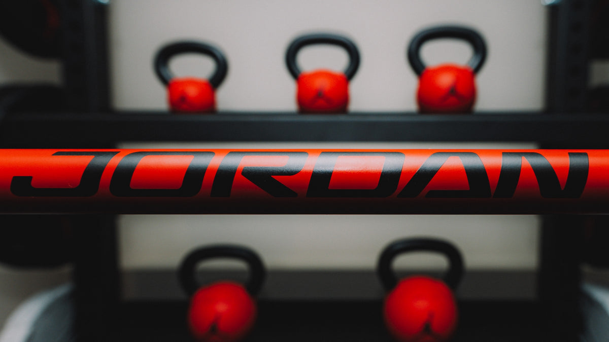 Jordan Strength Shield Barbell 20 kg - JORDAN Wordmark