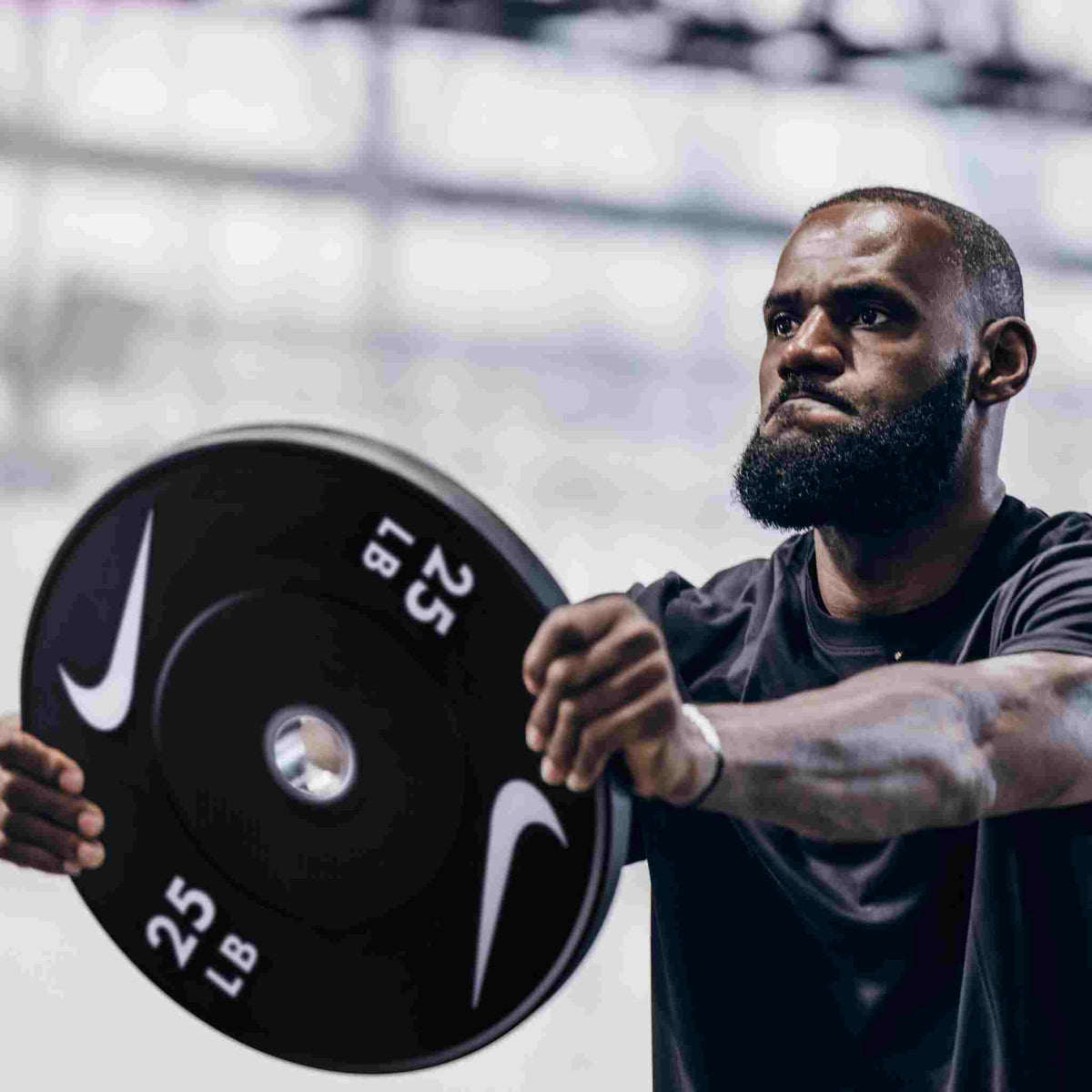 Black/White Dumbbells / Nike Black Bumper Plates / Nike Strength Shield Barbell 15 kg - Orange Swoosh | Black/White Dumbbells / Nike Black Bumper Plates / Nike Strength Shield Barbell 20 kg - Orange Swoosh | Black/White Dumbbells / Nike Black Bumper Plates / Nike Strength Shield Barbell 20 kg - Red Swoosh | Black/White Dumbbells / Nike Black Bumper Plates / Nike Strength Shield Barbell 20 kg - Black ("Just Do It")