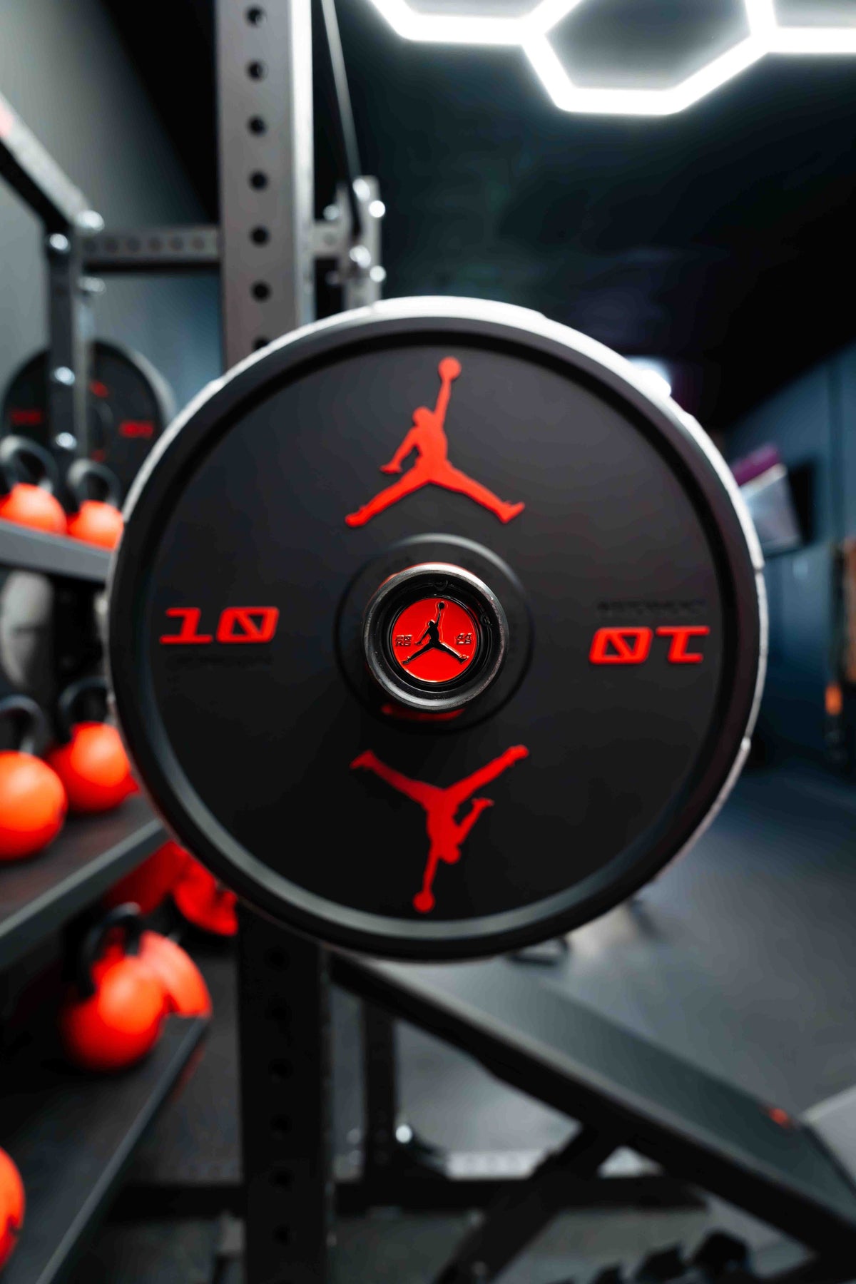 Jordan Strength 10 lb bumper plate on the bar | Jordan Strength Bumper Plates (10 and 15 lb pairs)